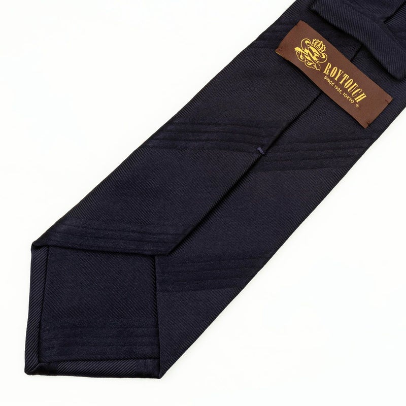 ROYTOUCHネクタイ ソリッド凹凸ストライプ・ネイビーの裏面の画像